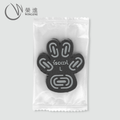 Black paw traction pad in supplier packaging