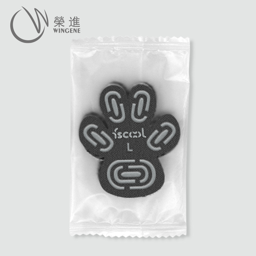Black paw traction pad in supplier packaging